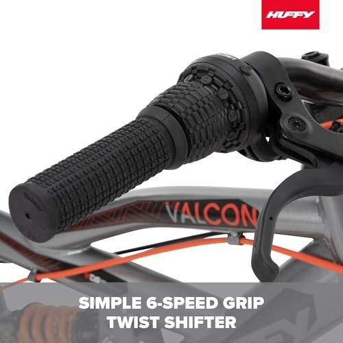Close-up of a Huffy bike handlebar with a 6-speed grip twist shifter.