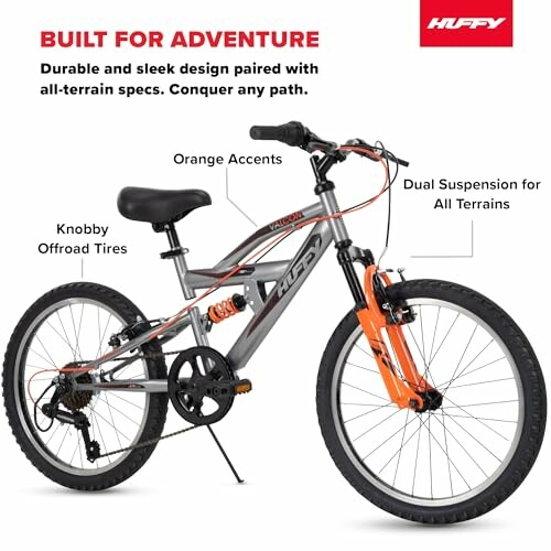 Huffy mountain bike with dual suspension and knobby tires.