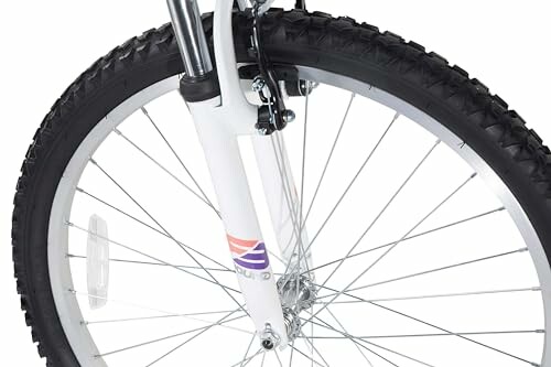 Close-up of a mountain bike front wheel with a suspension fork.